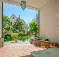 Bild (37e803aeedbec90ce17eaf27440b112b): Einfamilienhaus nach WEG mit Laden und ELW mit herrlichem Gartenhof und Garage